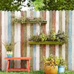 decorative gutter garden on fence