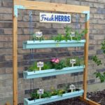 Free standing hanging gutter garden